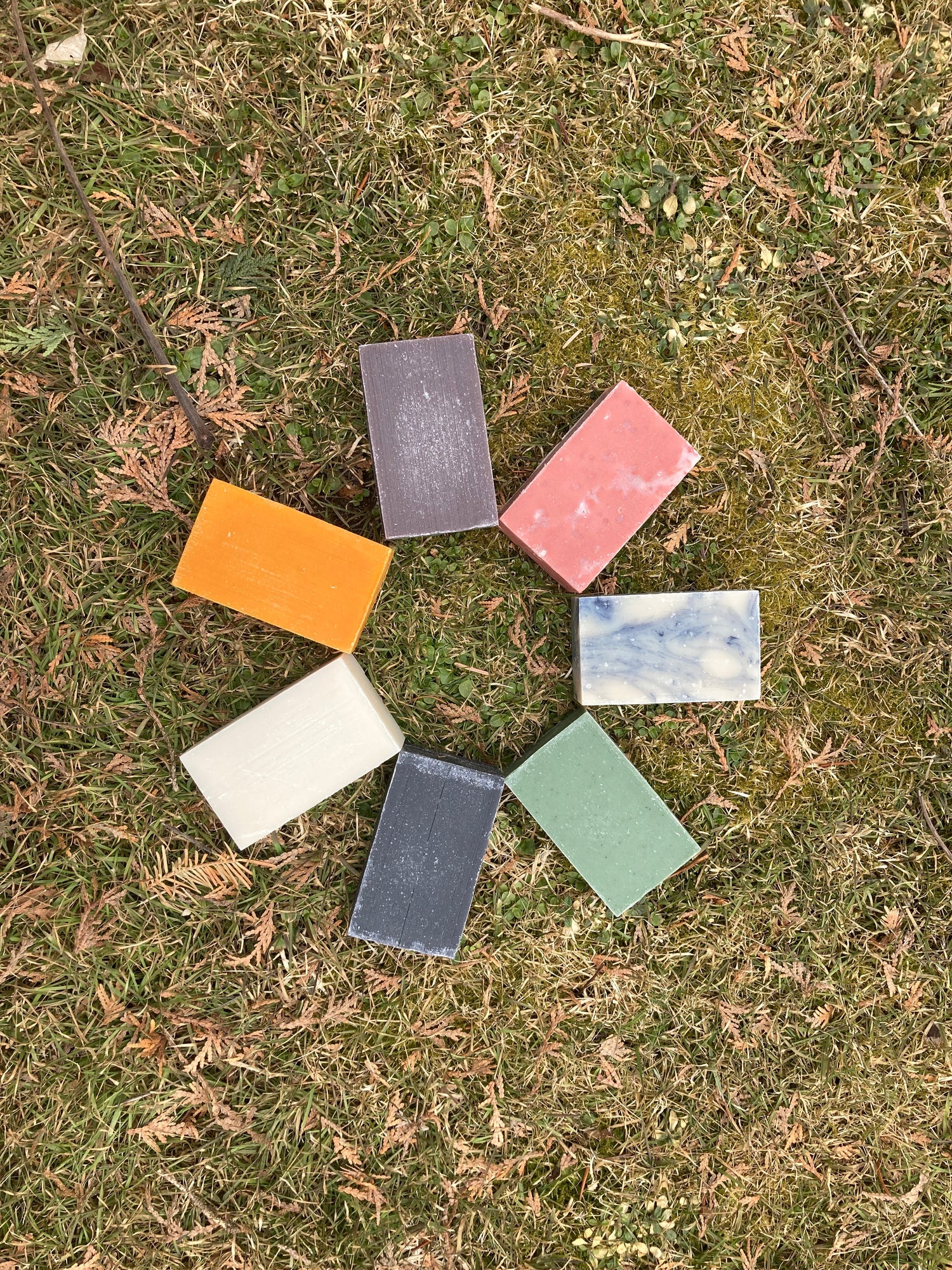a circle of colorful soap on a natural landscape